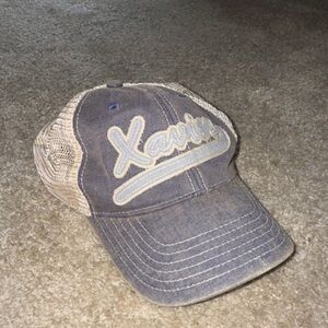 Xavier Musketeers Mesh Trucker Hat
Blue Beige Adjustable NCAA Fan
Apparel